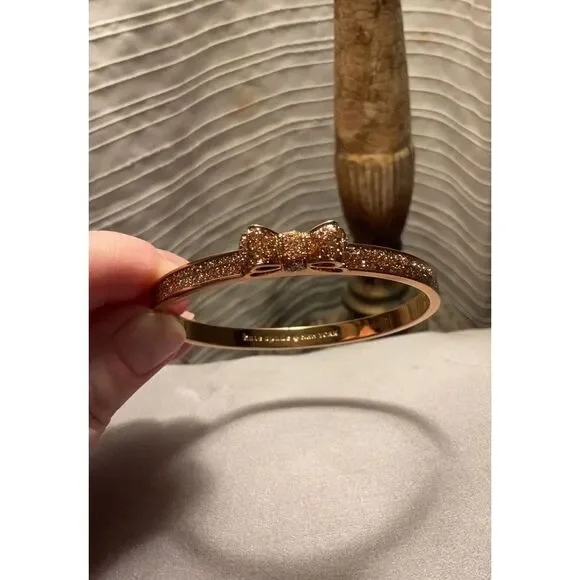 Kate Spade New York Gold Tone Glitter Bow Bangle Bracelet Round Hinged Cuff - Picture 6 of 11